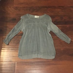 Gray shirt from buckle!